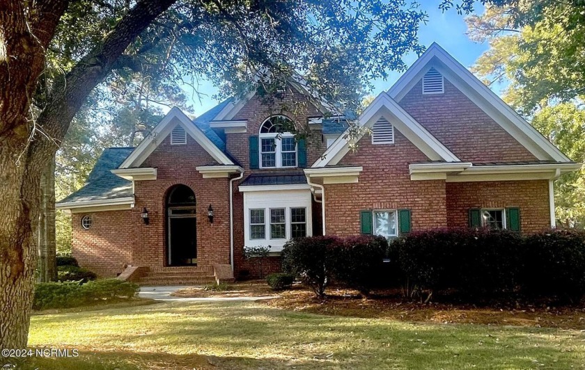 Discover luxury living in this exquisite 4-bedroom, 3-bath home - Beach Home for sale in Ocean Isle Beach, North Carolina on Beachhouse.com