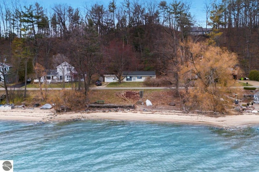 Boasting breath-taking views of East Bay, this 4 bedroom, 1 bath - Beach Home for sale in Traverse City, Michigan on Beachhouse.com