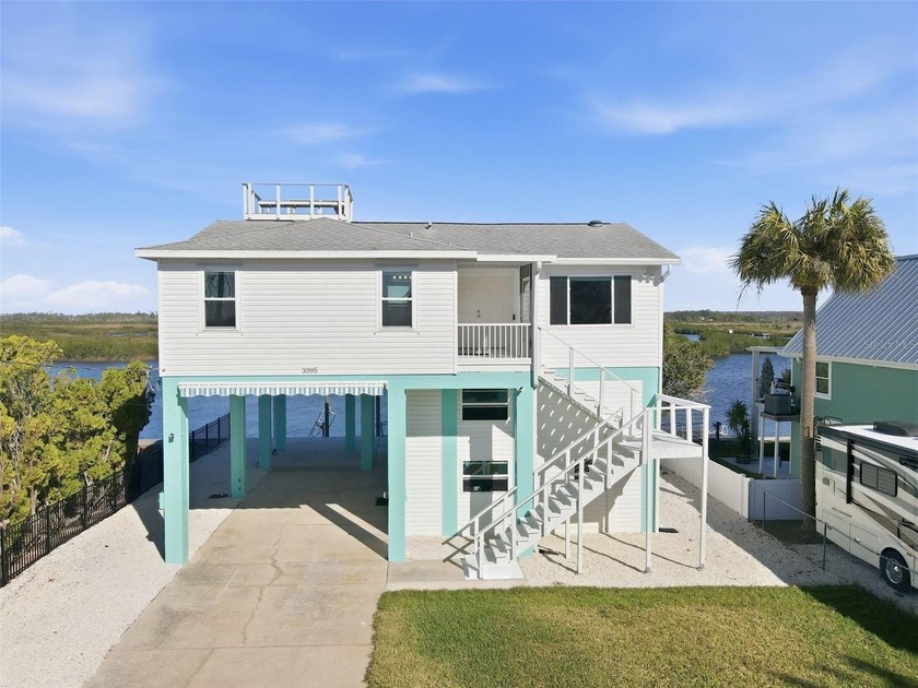 270 DEGREE SUNSET AND SUNRISE VIEWS OF THE GULF AND RIVER/MARSH - Beach Home for sale in Hernando Beach, Florida on Beachhouse.com