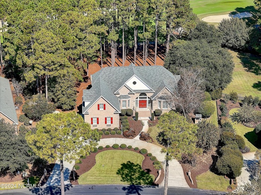 As you approach the circular driveway adorned with tasteful - Beach Home for sale in Southport, North Carolina on Beachhouse.com