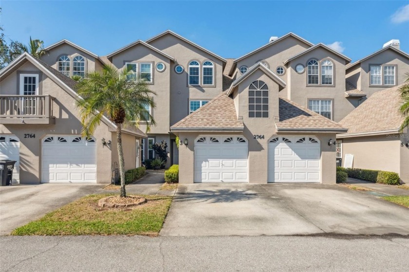Tucked away in a beautifully landscaped community, this 2400 - Beach Townhome/Townhouse for sale in Clearwater, Florida on Beachhouse.com