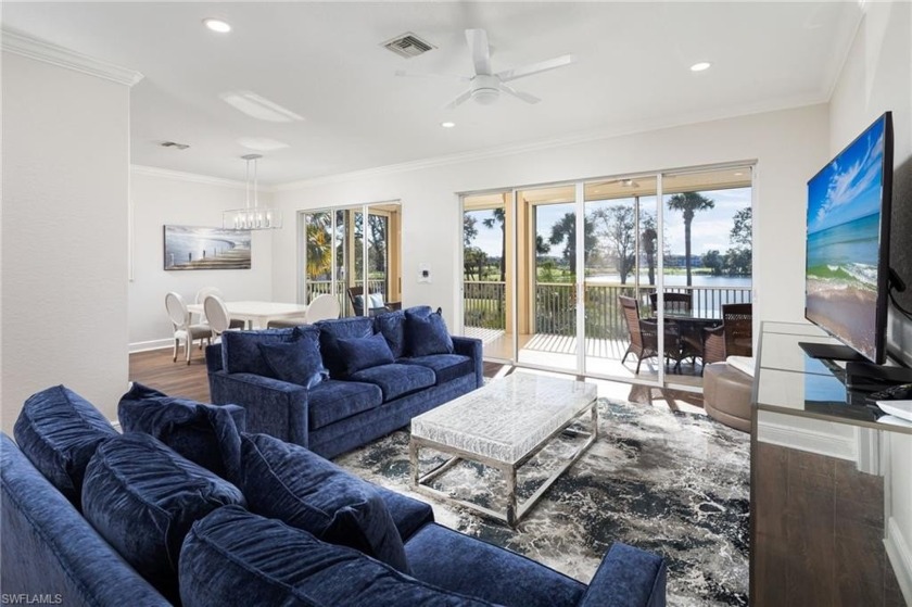 Wake up to wide lake and golf course views, highlighted by - Beach Home for sale in Naples, Florida on Beachhouse.com