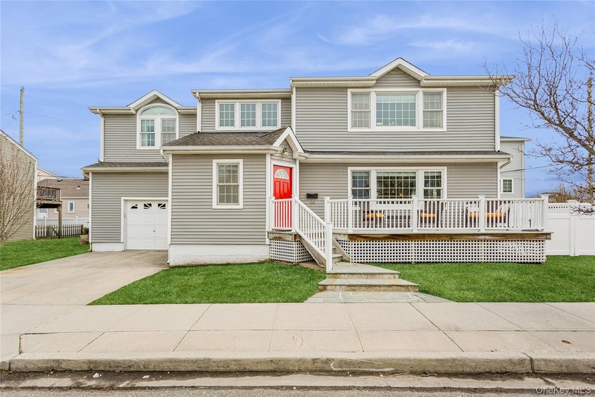 Welcome home to this stunning raised colonial nestled in the - Beach Home for sale in Long Beach, New York on Beachhouse.com