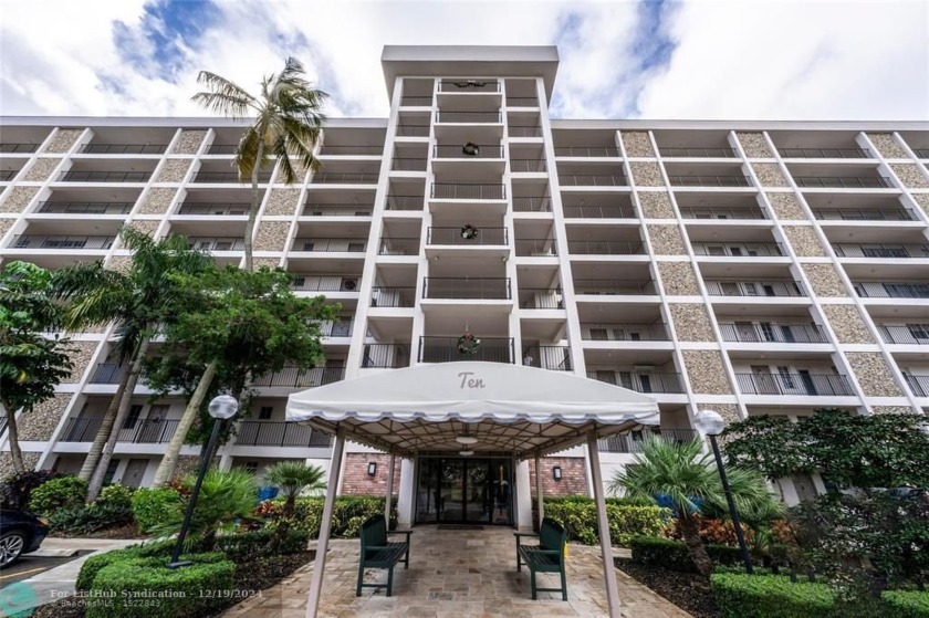 Enjoy golf views from a private screened patio in this updated - Beach Condo for sale in Pompano Beach, Florida on Beachhouse.com