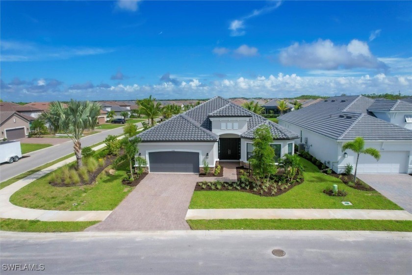 Welcome to your dream home in the prestigious Esplanade Lake - Beach Home for sale in Fort Myers, Florida on Beachhouse.com