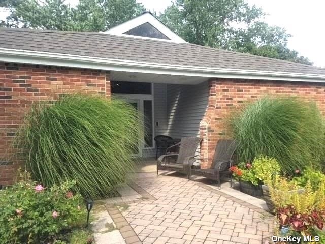 THIS CALIFORNIA EXPANDED RANCH STYLE HOME NESTLED IN THE DESIRED - Beach Home for sale in Rocky Point, New York on Beachhouse.com