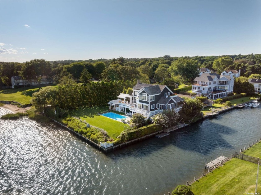 Enter the long private drive through the gates to your ultimate - Beach Home for sale in Southampton, New York on Beachhouse.com