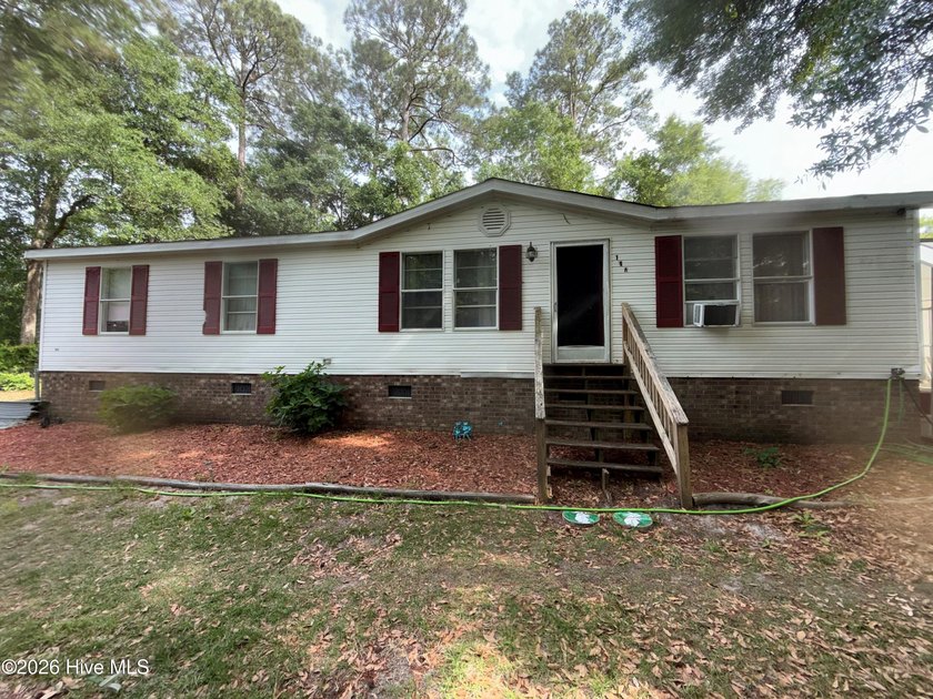 If you're looking for a quiet place at the beach, tucked away - Beach Home for sale in Shallotte, North Carolina on Beachhouse.com