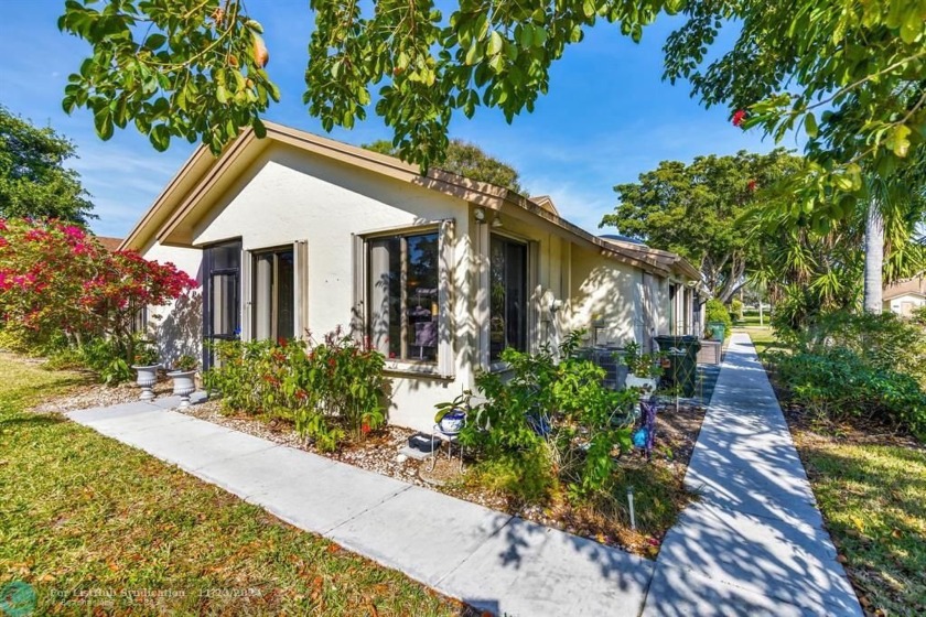 This serene lake view home is in the very active 55+ community - Beach Condo for sale in Delray Beach, Florida on Beachhouse.com