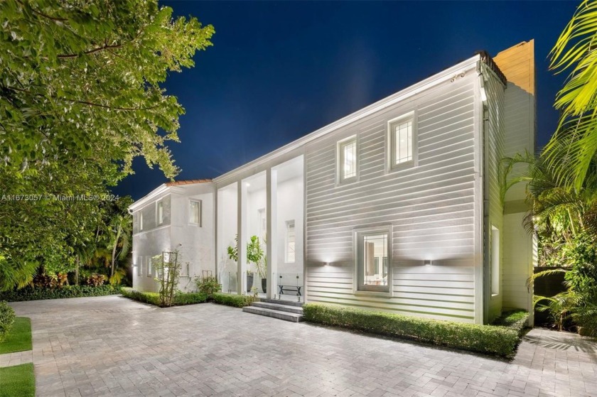 Discover this exquisite fully renovated two-story residence in - Beach Home for sale in Miami Beach, Florida on Beachhouse.com