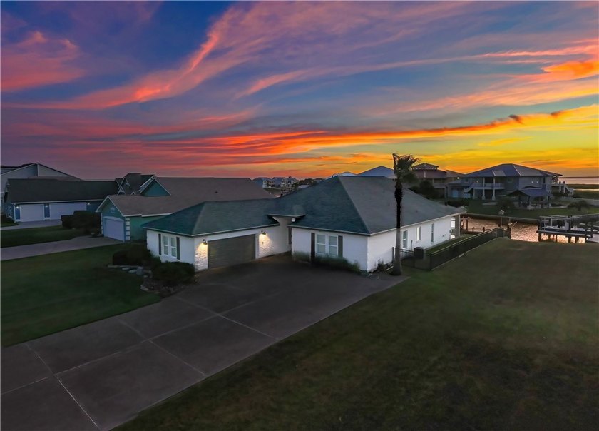 Wonderful one-story brick canal-front home with 4BR, 3 full - Beach Home for sale in Rockport, Texas on Beachhouse.com