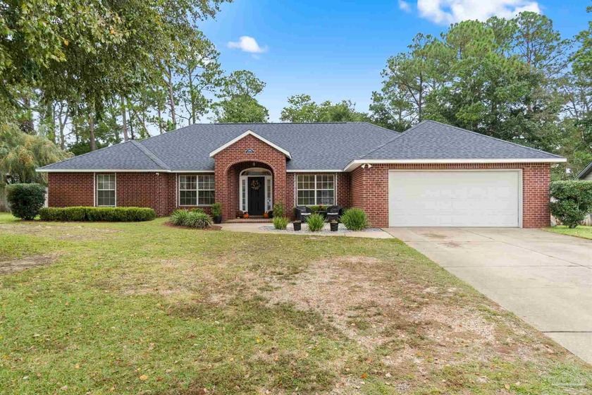 Welcome to this spacious 4 bedroom, 3 bathroom home in Tiger - Beach Home for sale in Gulf Breeze, Florida on Beachhouse.com
