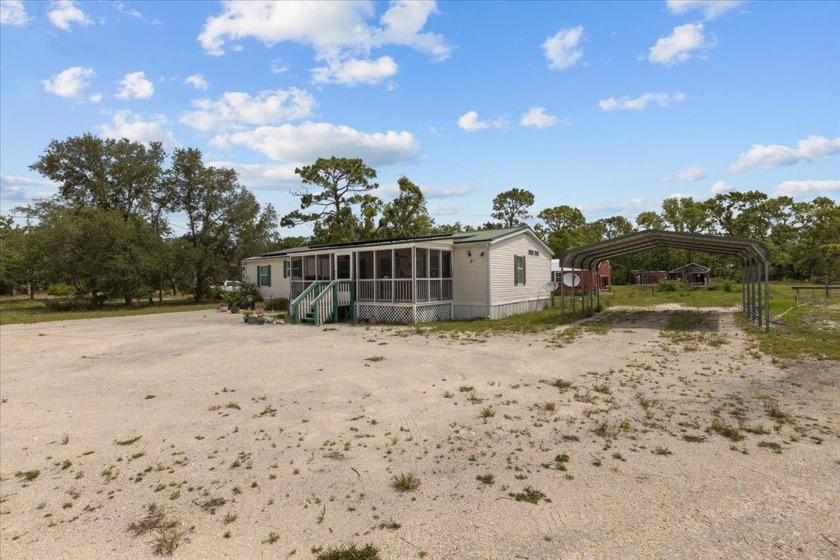 Discover the charm of countryside living with this well-kept - Beach Home for sale in Perry, Florida on Beachhouse.com