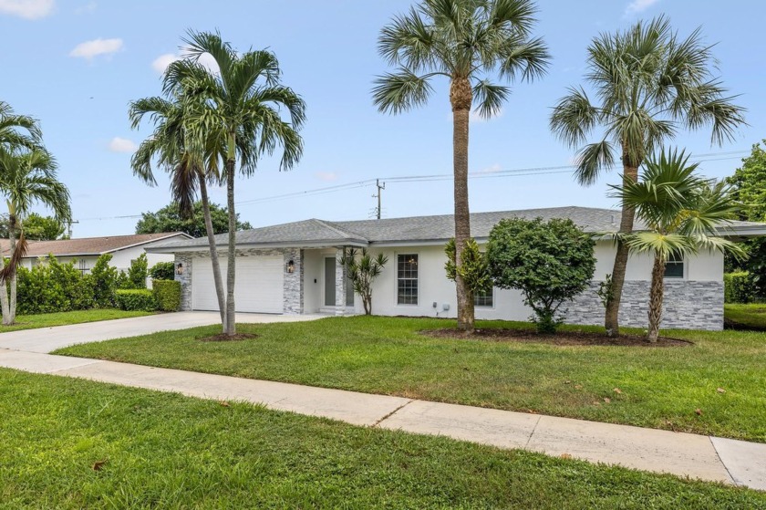 Turn key spacious 4 bedrooms and 2 bathroom house with 2 car - Beach Home for sale in Boca Raton, Florida on Beachhouse.com