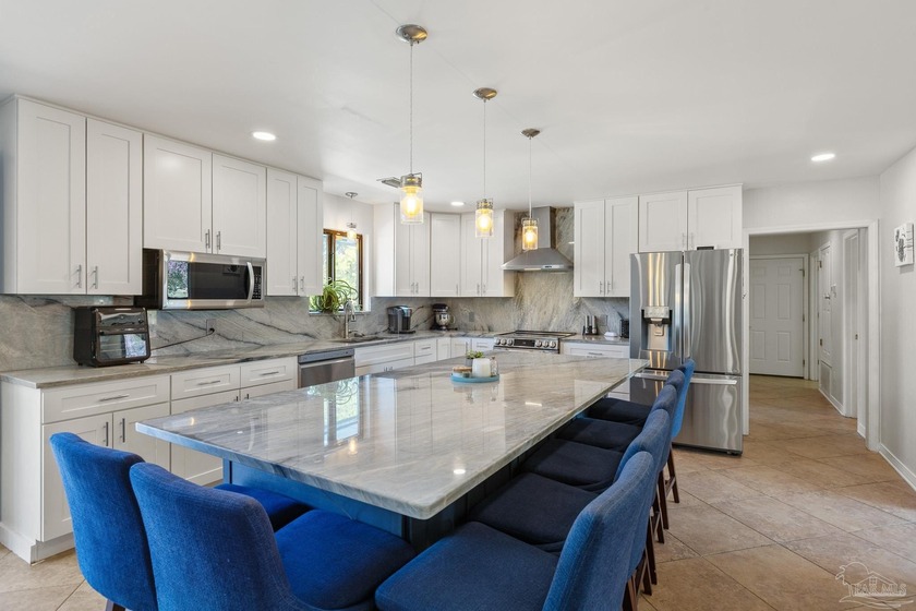 Discover effortless Florida living in this beautifully updated - Beach Home for sale in Gulf Breeze, Florida on Beachhouse.com