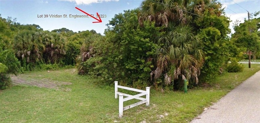 Discover a rare opportunity to own an OVERSIZED WATERFRONT LOT - Beach Lot for sale in Englewood, Florida on Beachhouse.com