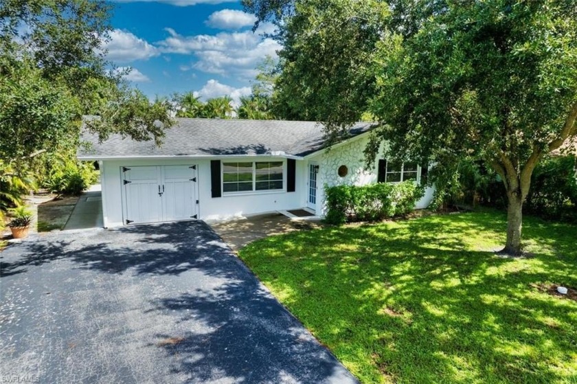 Investment Opportunity!  This 4BR/2BA vaulted cage pool home is - Beach Home for sale in Naples, Florida on Beachhouse.com