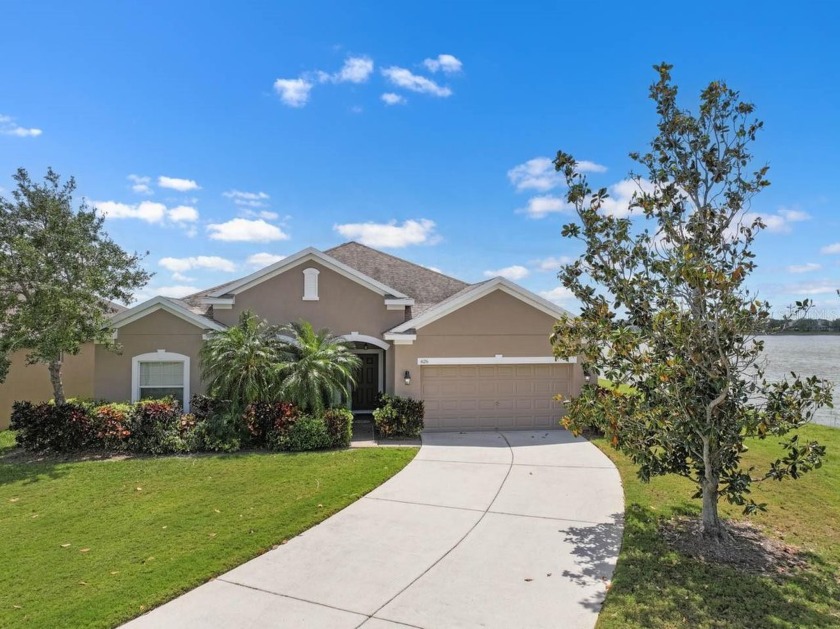 Serene WATER VIEWS in this beautiful 3-bed, 2.5-bath, 3-car - Beach Home for sale in Ruskin, Florida on Beachhouse.com