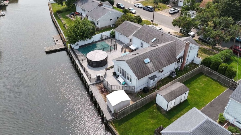 Come check out this beautiful waterfront home with over 80' of - Beach Home for sale in Seaford, New York on Beachhouse.com