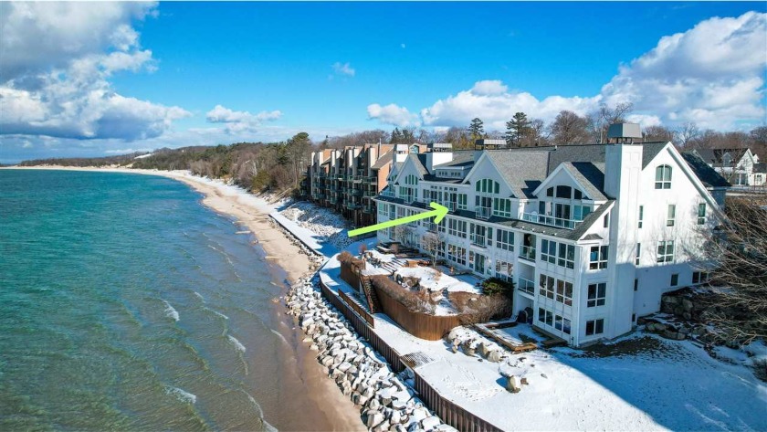 This spectacular Lake Michigan waterfront Condo is waiting for - Beach Home for sale in Charlevoix, Michigan on Beachhouse.com
