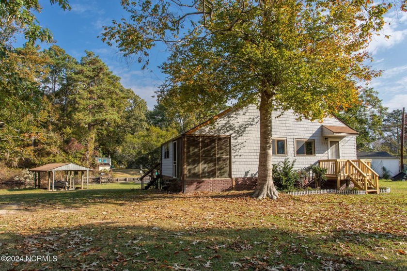 This adorable cottage is located along a canal that leads to the - Beach Home for sale in Hertford, North Carolina on Beachhouse.com