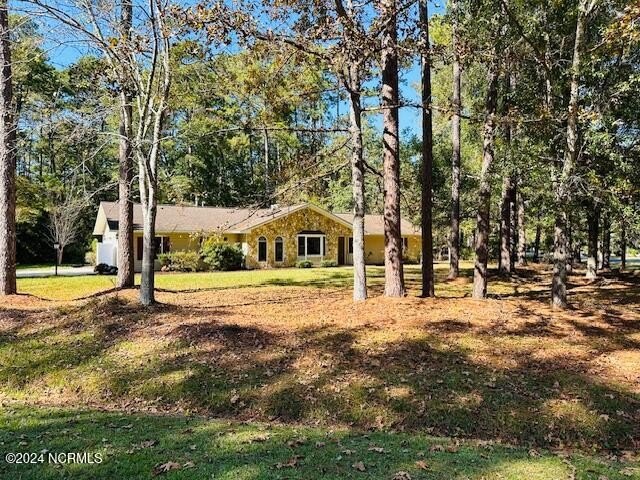 Location Location. Ranch style home on a beautiful corner lot - Beach Home for sale in Calabash, North Carolina on Beachhouse.com