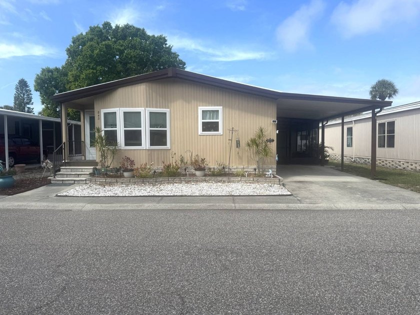 COME TO PARADISE AND FEEL THE GULF BREEZE FROM YOUR LANAII IN - Beach Home for sale in Tarpon Springs, Florida on Beachhouse.com