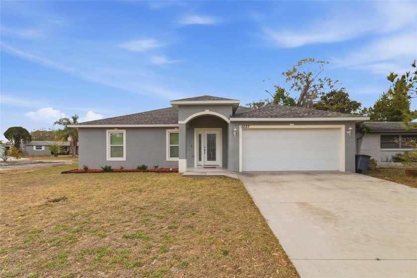 Your 3-bedroom, 2-bathroom, 2-car garage, low maintenance home - Beach Home for sale in New Port Richey, Florida on Beachhouse.com