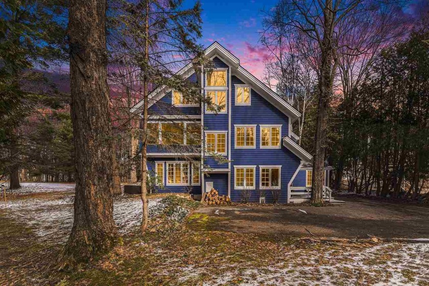 This home, nestled on a wooded lot located in Harbor Springs, is - Beach Home for sale in Harbor Springs, Michigan on Beachhouse.com