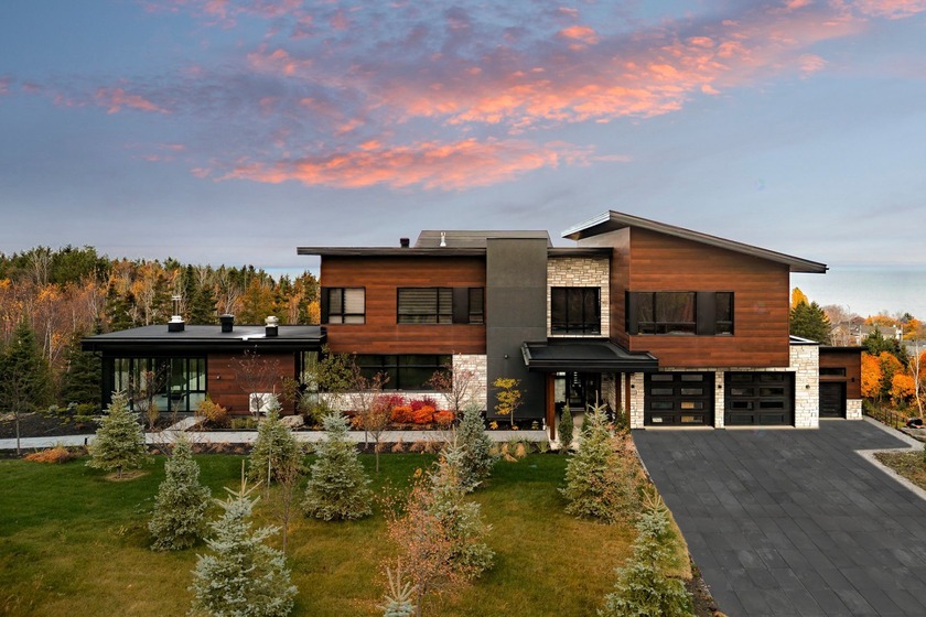 Nestled on an exceptional private lot, this prestigious - Beach Home for sale in Rimouski,  on Beachhouse.com
