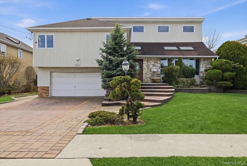 This is the waterfront home you have been waiting for! This - Beach Home for sale in Oceanside, New York on Beachhouse.com