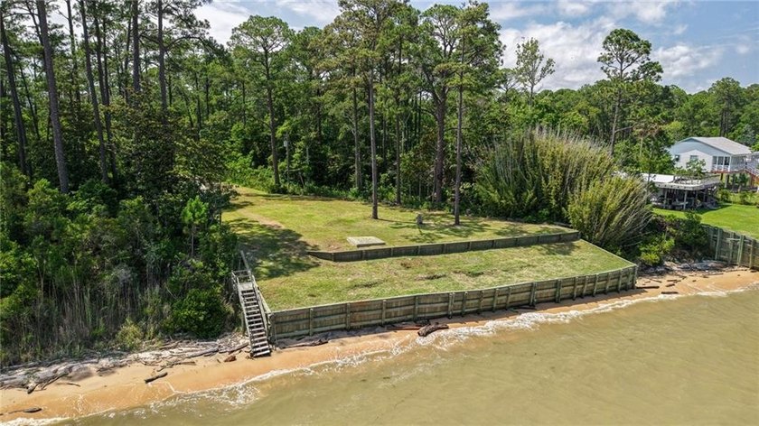 Discover a rare opportunity to own a prime waterfront lot - Beach Lot for sale in Coden, Alabama on Beachhouse.com