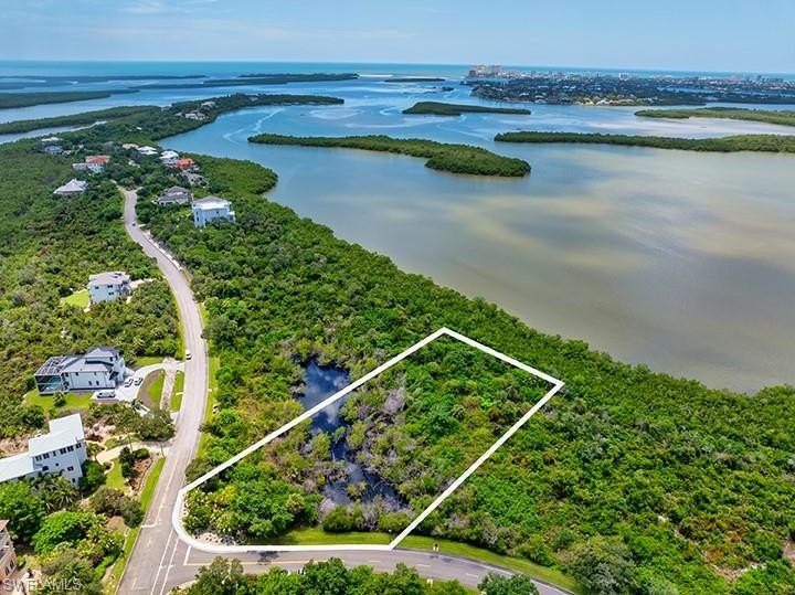 Escape to your private island gated community of Key Marco - a - Beach Lot for sale in Marco Island, Florida on Beachhouse.com