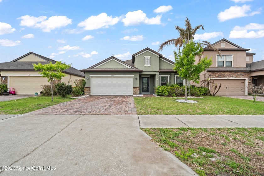 Welcome to this beautifully maintained 4-bedroom, 2-bath home in - Beach Home for sale in Cocoa, Florida on Beachhouse.com