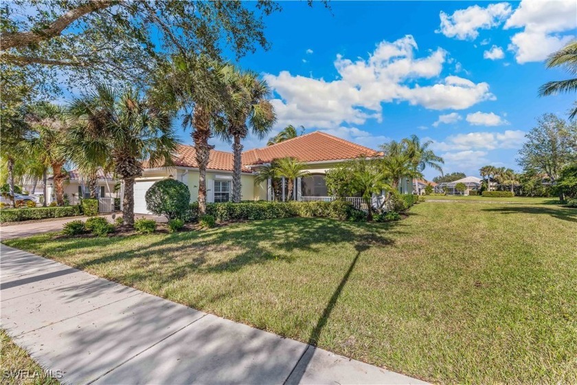 Welcome to your dream home in Verona Walk, a prestigious DiVosta - Beach Home for sale in Naples, Florida on Beachhouse.com