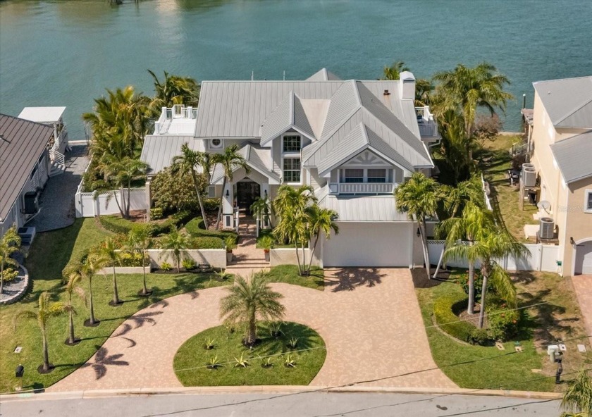 Welcome Home to the Best of Waterfront Living (rare 111 ft wide - Beach Home for sale in Belleair Beach, Florida on Beachhouse.com