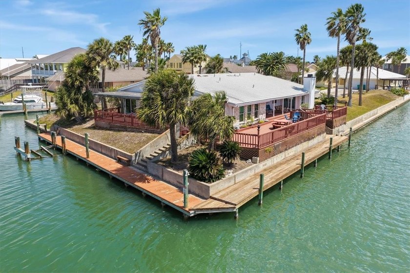 Perched on a premier point in the gated waterfront community of - Beach Home for sale in Aransas Pass, Texas on Beachhouse.com