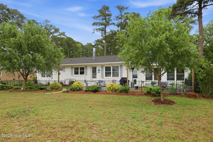 This charming waterfront cottage is tucked along a quiet stretch - Beach Home for sale in Washington, North Carolina on Beachhouse.com