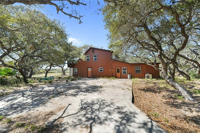 A rare opportunity to own acreage, mature trees, and a - Beach Home for sale in Aransas Pass, Texas on Beachhouse.com