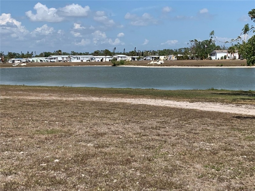 RARE FIND - WATERFRONT LOT in the friendly waterfront community - Beach Lot for sale in Port Charlotte, Florida on Beachhouse.com