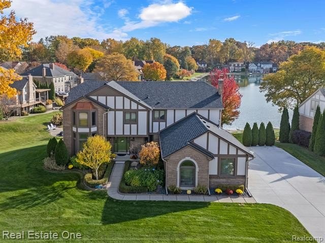 Lake Front Living-Sherwood Forest Subdivision! This impressive - Beach Home for sale in Shelby, Michigan on Beachhouse.com