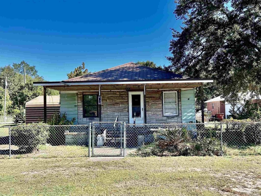 Charming Fixer-Upper, Endless possibilities!  Located in the - Beach Home for sale in Milton, Florida on Beachhouse.com