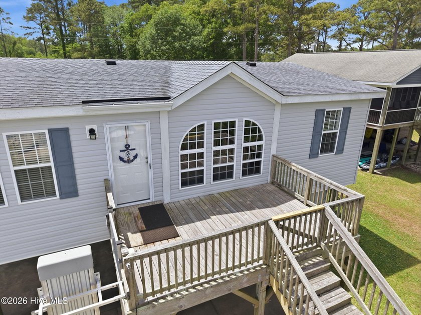 Waterfront living is calling with this fully furnished 3-bedroom - Beach Home for sale in Aurora, North Carolina on Beachhouse.com