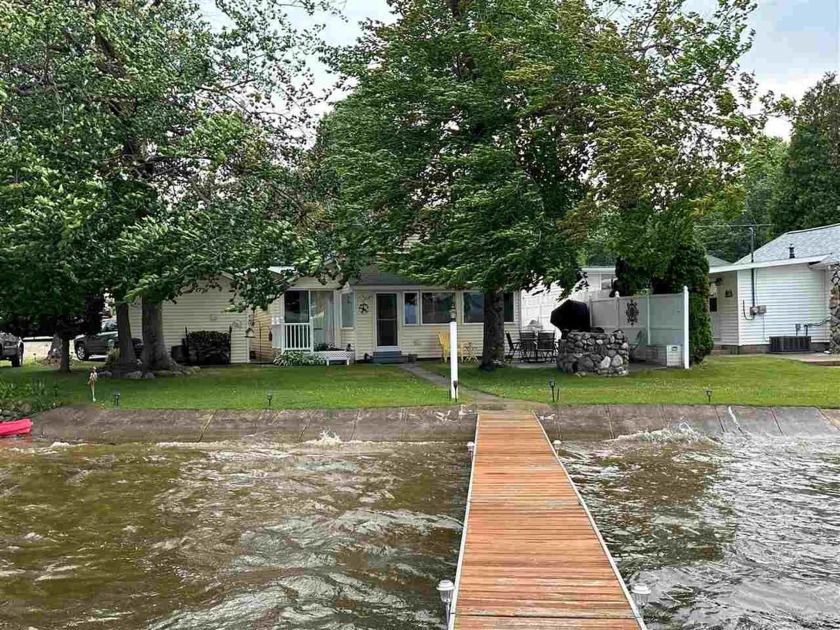 Ready to enjoy your summer on the lake? 2 bed/ 1 bath home with - Beach Home for sale in Carp Lake, Michigan on Beachhouse.com