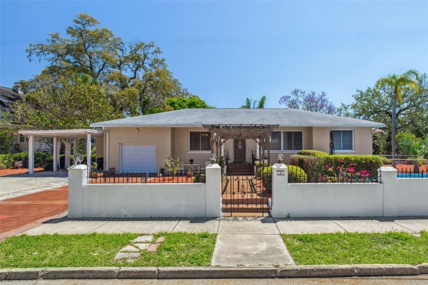 Who doesn't love a brick paved road? Enter this charming older - Beach Home for sale in Tarpon Springs, Florida on Beachhouse.com