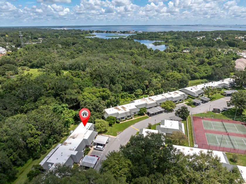 Villa-Style Condo with courtyard patio, screened lanai and - Beach Condo for sale in Clearwater, Florida on Beachhouse.com