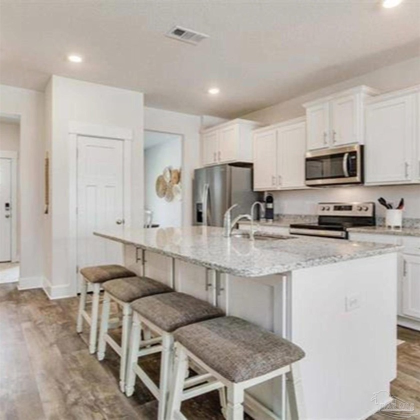 The home is ideally located close to pristine beaches, shopping - Beach Home for sale in Pensacola, Florida on Beachhouse.com