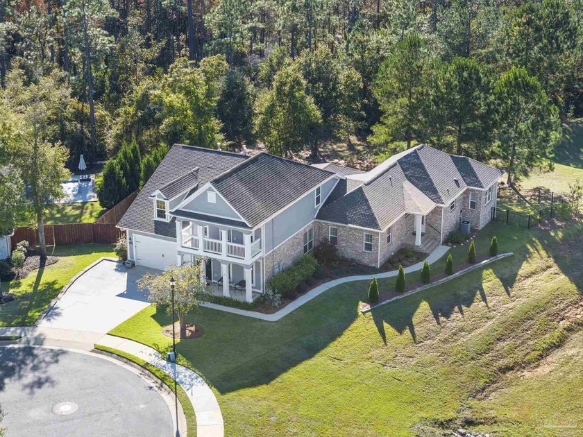 Discover unparalleled luxury and versatility at 5861 Sword Fern - Beach Home for sale in Pensacola, Florida on Beachhouse.com