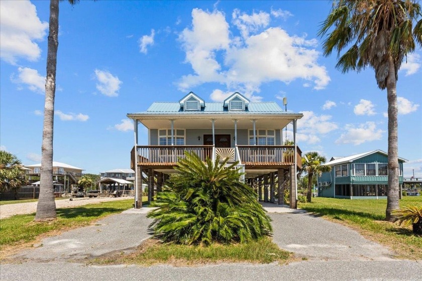 Step back in time with this beautiful 1940 classic home, nestled - Beach Home for sale in Keaton Beach, Florida on Beachhouse.com
