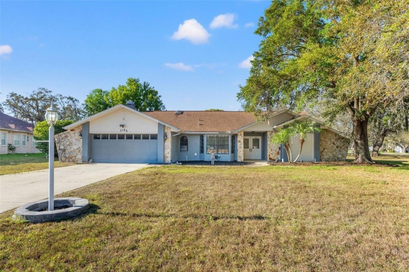 Welcome home, and welcome to the desirable Lake in the Woods - Beach Home for sale in Spring Hill, Florida on Beachhouse.com